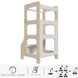 May include: A white and natural wood children's learning tower with three shelves and a small step stool. The tower has a white top shelf with a metal rod for hanging items. The tower is designed for children to reach countertops and participate in kitchen activities.