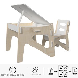 May include: A white and natural wood children's desk and chair set with a lift-up top. The desk has a storage compartment underneath. The chair has a simple design with a back and seat.