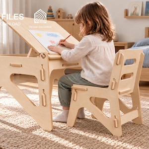 May include: A light-coloured wooden desk and chair set with an adjustable angled tabletop surface. The desk features cut-out side panels and the text CNC FILES DIGITAL DOWNLOAD and Wood Decoded with icons for DXF, SVG, STP, and AI file formats.