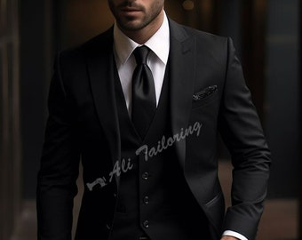 May include: A black three-piece suit with a black satin tie. The suit jacket has a single button closure and a pocket square. The vest has a button closure and the pants have a belt loop.