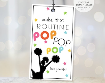 May include: A printable cheerleading themed gift tag with the text "make that routine POP POP POP" and "love jennifer". The tag features a silhouette of a cheerleader with pom-poms.