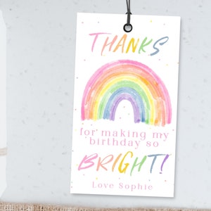 May include: A rainbow-themed thank you tag with the text "THANKS for making my birthday so BRIGHT! Love Sophie" and a watercolor rainbow illustration.