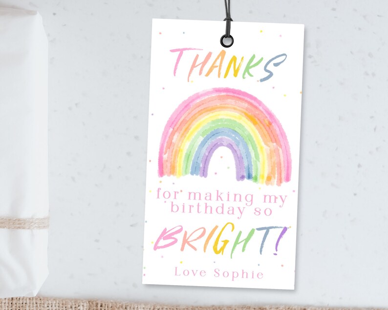 May include: A rainbow-themed thank you tag with the text "THANKS for making my birthday so BRIGHT! Love Sophie" and a watercolor rainbow illustration.