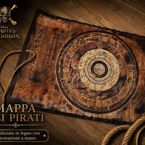May include: A rectangular wooden Pirates of the Caribbean map featuring a central circular navigational design with concentric rings, weathered brown tones, and dark text. A thick tan rope is attached to the left side of the wooden board.