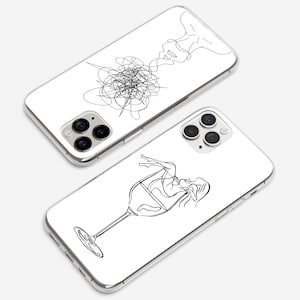 May include: Two clear phone cases with black line drawings. One case features a woman's face with lines extending from her head. The other case features a woman's body inside a wine glass.