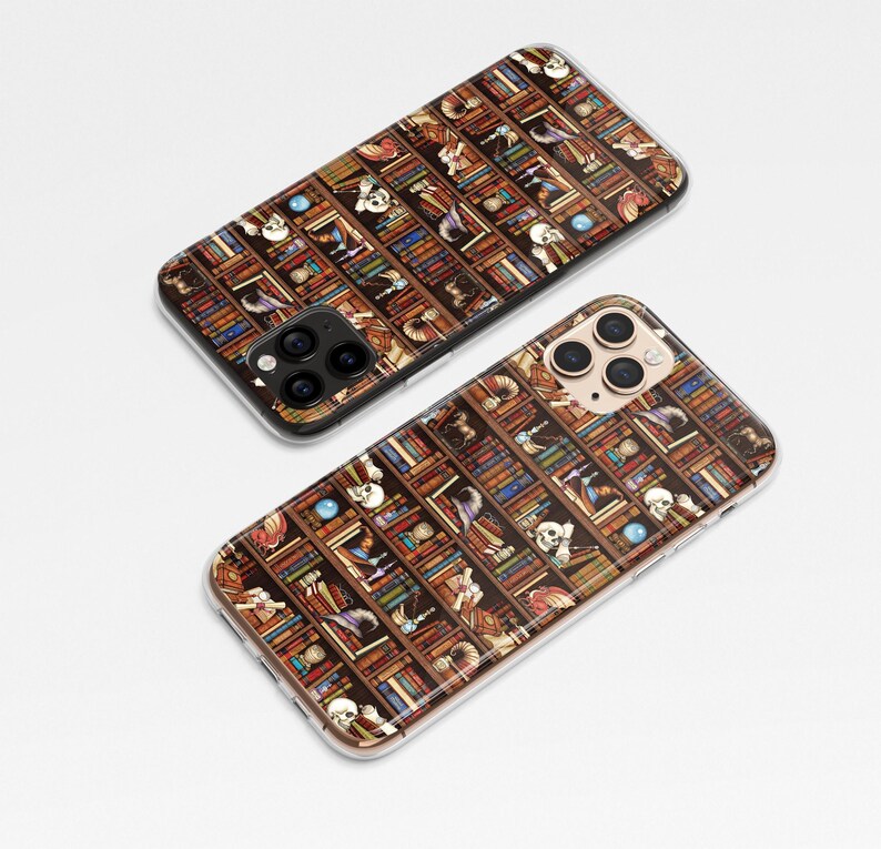 May include: Two phone cases with a pattern of books, skulls, and other magical objects. The cases are clear and show the phone's camera lenses.
