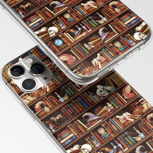 May include: A clear phone case with a design of a bookshelf filled with books, potions, and other magical items. The bookshelf is brown with gold accents. The phone case is designed for an iPhone.