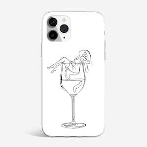 May include: A white phone case with a black line drawing of a woman inside a wine glass.