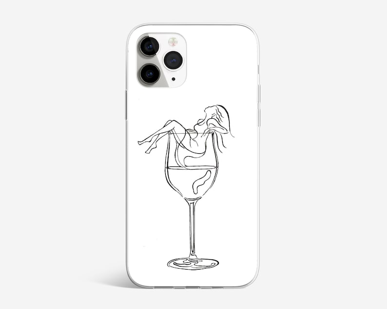 May include: A white phone case with a black line drawing of a woman inside a wine glass.