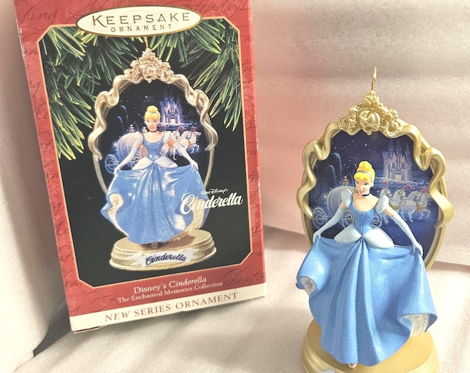 This is a vintage 1997 Disney Hallmark Keepsake Ornament, complete with the original box. A9/26