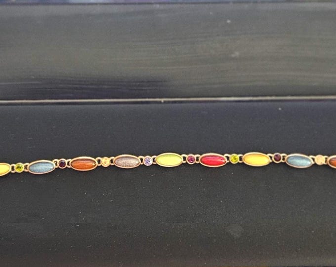 Vintage Liz Claiborne Bracelet, 7.75 inches long, featuring various colored stones and diamonds. (Closet)