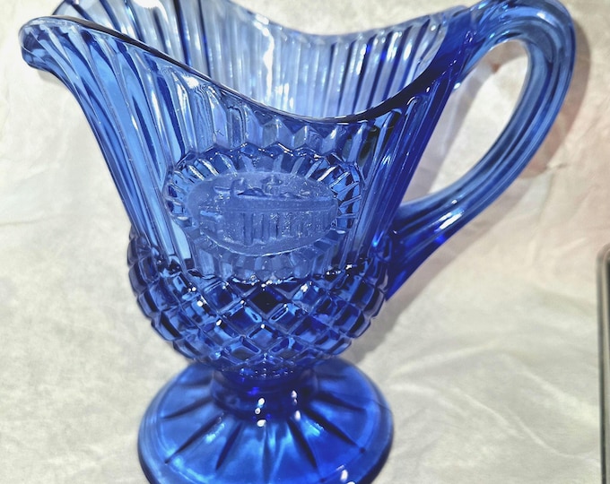 Vintage Avon Fostoria Cobalt Blue Glass pitcher featuring a raised cameo design of Mount Vernon, Washington home F10/7