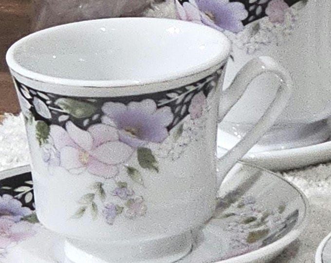 Vintage  teacups and saucers set of 13 vintage teacups and saucers, made of china  ( in box)