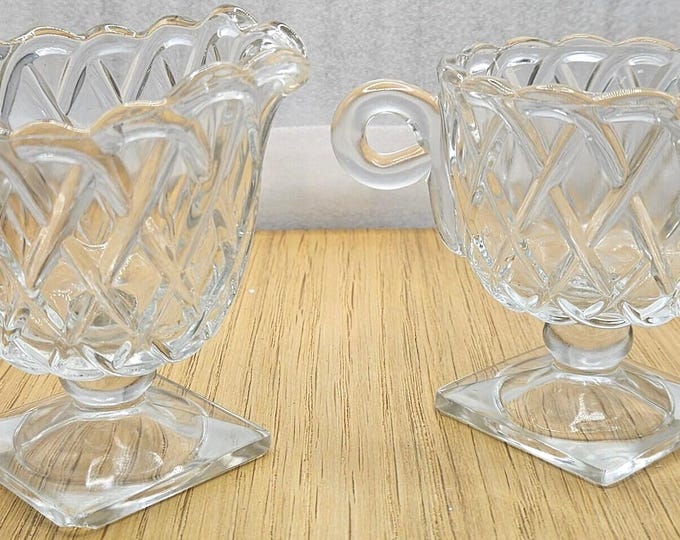 Square-footed sugar and creamer set in the Indian glass pretzel pattern,  C2/2/25.