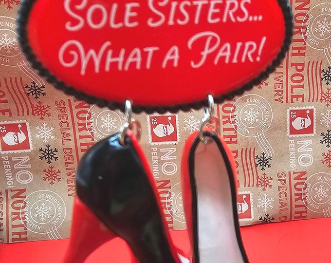 Vintage 2010 Hallmark Keepsake ornament titled "Sole Sisters" for Christmas. C4/18.