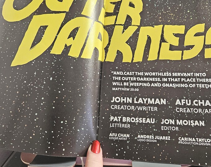 The comic book Outer Darkness, first edition, was published by John Layman, AFU CHAN (closet).