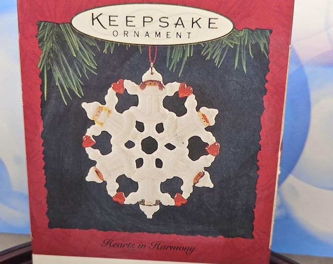 Vintage Hallmark Keepsake Ornament from 1994 titled "Hearts in Harmony,"  A2/33.
