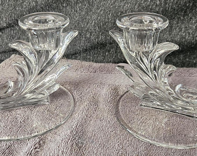 Set of two vintage Fostoria candle holders. It is made of etched crystal and is in the shape of a baroque. A6/10