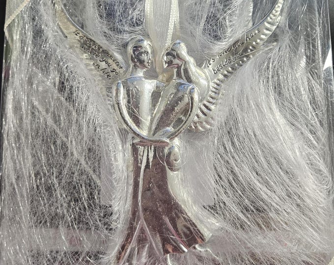 "Serenity Seasons of Cannon Falls: Angel Eleanor Roosevelt." Ornament in Silver C7/25