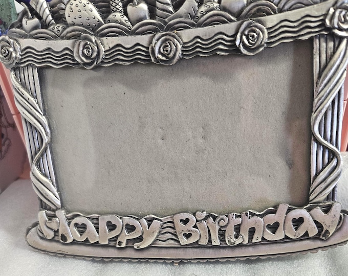 Metal picture frame shaped like a birthday cake (J box)
