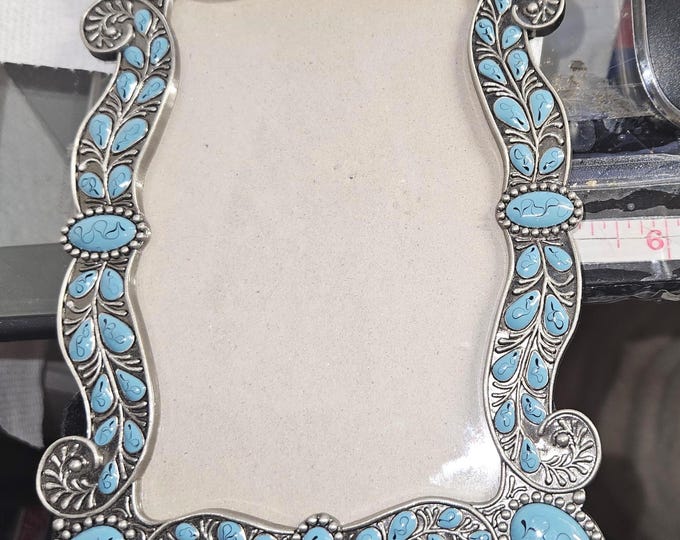 Americana Silver Spike with its vibrant turquoise frame F10 /21