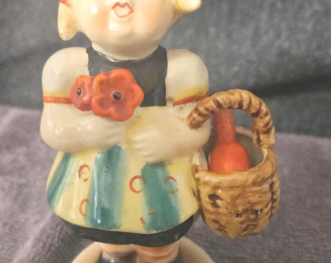 Vintage porcelain 1950s made in occupied Japan girl holding a basket with bottle D5/24