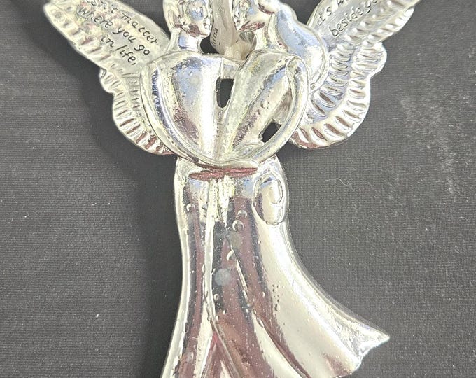 "Serenity Seasons of Cannon Falls: Angel Eleanor Roosevelt." Ornament in Silver C7/25