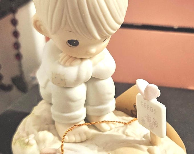 Limited edition collector's series from the Precious Moments Club. It features a collectible figurine" In His Time" pm-872 Box 4/13