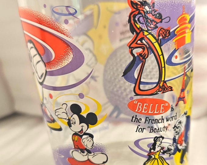 McDonald's: 100 Years of Magic – featuring Buzz Lightyear, Belle, Mickey Mouse, and Aladdin.D1/14