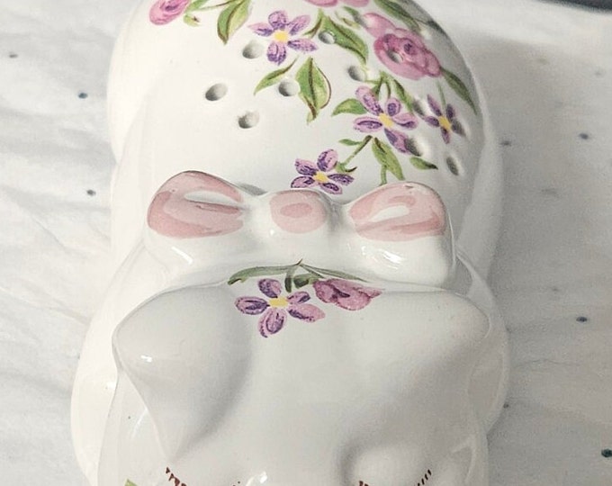 Avon 1978 Porcelain Sleeping Pig Hand Decorated with Flowers, Potpourri Holder. White with Pink and Lavender. 2.5" wide x 5" long