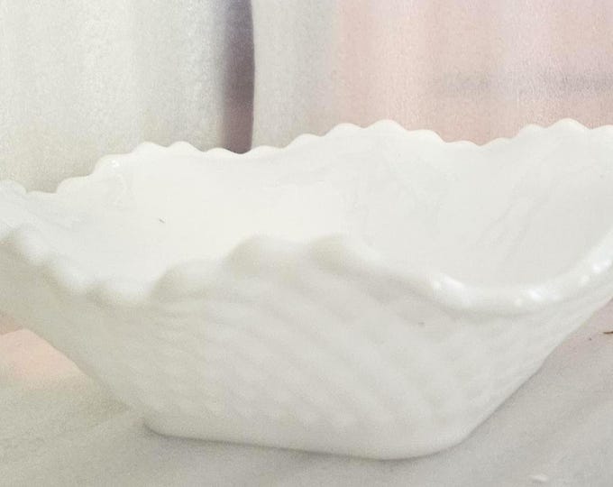 Vintage Hazel Atlas milk glass features a ruffled edge with a diamond square pattern.D7/18