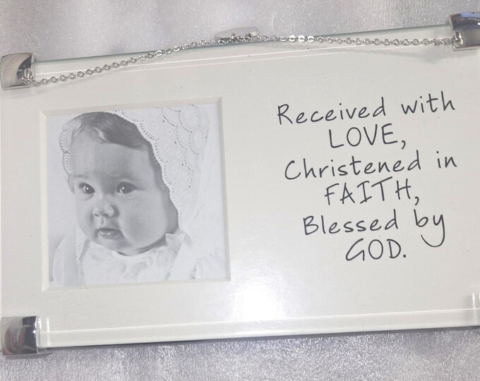 Received with Love, Christened in FAITH, Blessed by god.  2x2-inch photo frame