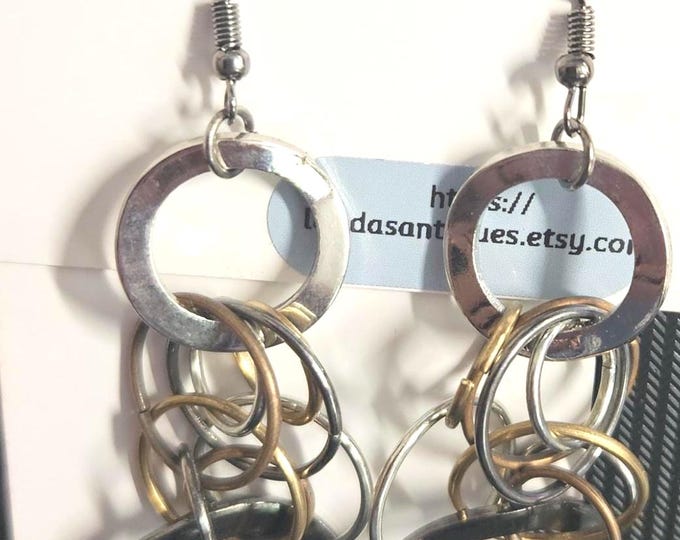 Vintage Mean Machine Multi-Earrings feature different sizes of hoops, making them very attractive. (Box)