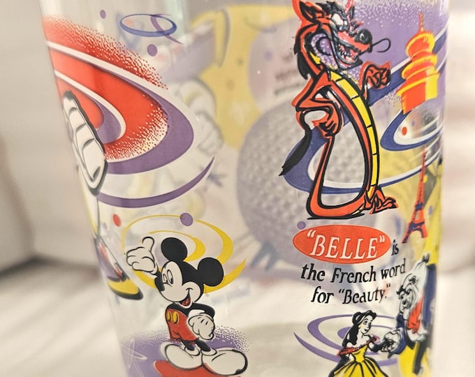 McDonald's: 100 Years of Magic – featuring Buzz Lightyear, Belle, Mickey Mouse, and Aladdin.D1/14