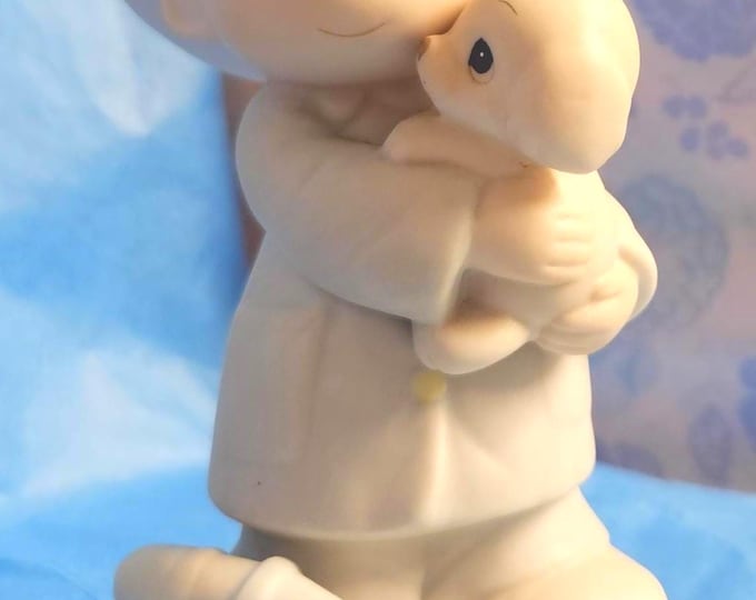 Precious Moments figurine titled "Love Rescued Me," item number 102393, in box 4 of 40.