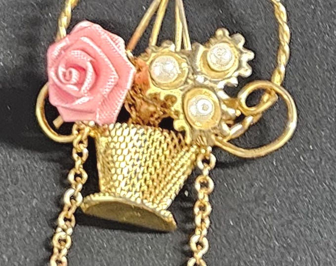 Art Nouveau French pendant featuring a basket of flowers with pearl accents, pink flower, and a long gold chain with two connected pendants.