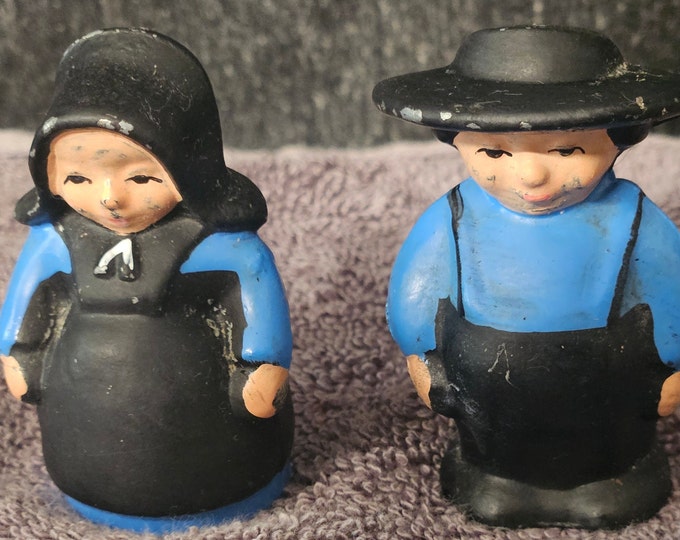 Rare set of Cast Iron Amish Man and women Salt and pepper shakers