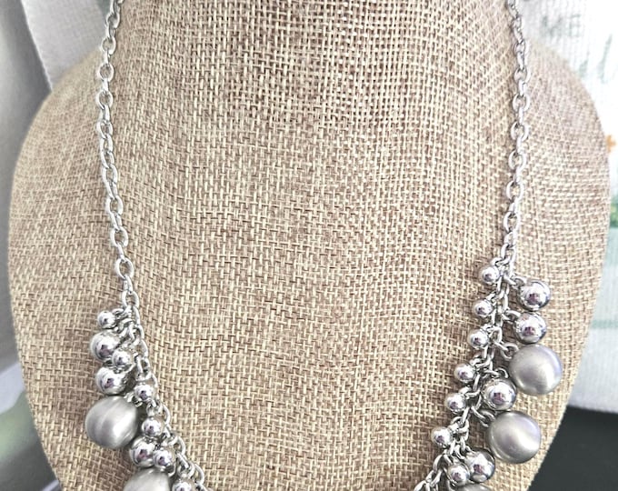 Discover the charm of a vintage Lia Sophia silver-tone necklace featuring striking round beads on a 16-inch chain. With Extension  (Closet)
