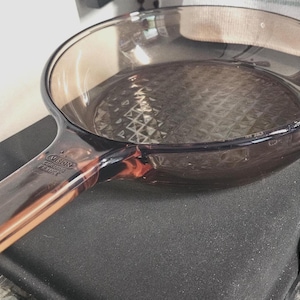 Corningware Vision Waffle bottom 7&quot; Amber glass skillet, Model Number 37, from the 1970s. C7/29