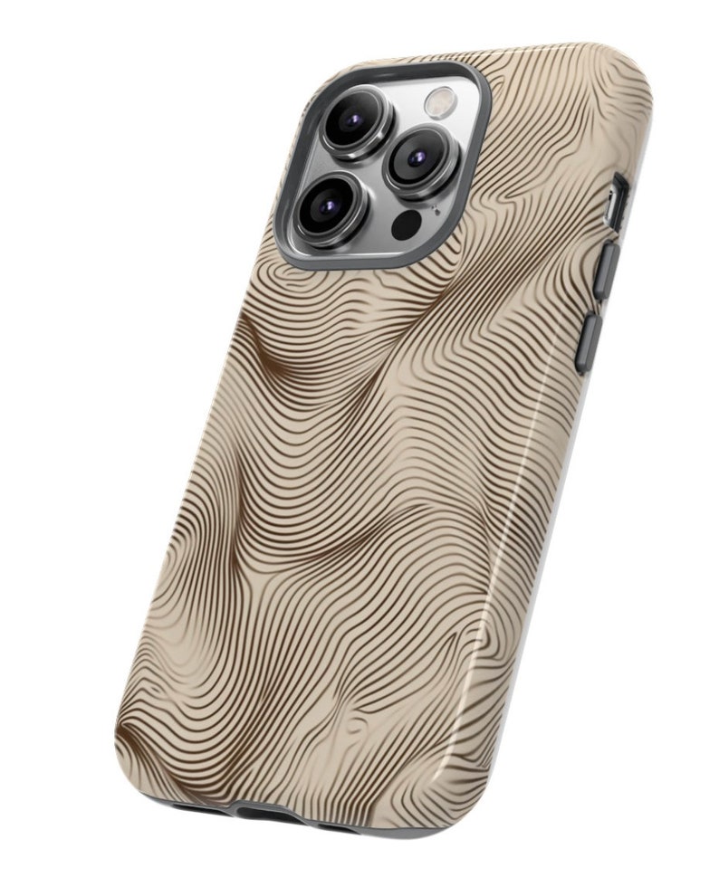 May include: A beige phone case with a brown wavy line pattern. The case has a camera lens cutout and a cutout for the phone's buttons.