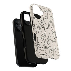 May include: A black smartphone with a protective case featuring a cream-colored background and a repeating line art design of faces. The case is detached, showing the phone's camera.