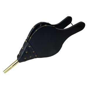 May include: Black leather bellows with a brass nozzle and decorative studs.