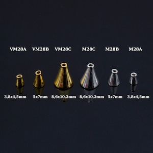 May include: Six cone-shaped metal beads in various sizes. The beads are gold and silver in colour. The beads are labelled with their sizes in millimetres: 3.8x4.5mm, 5x7mm, 8.6x10.2mm, 8.6x10.2mm, 5x7mm, 3.8x4.5mm.