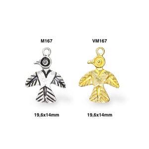 May include: Two bird-shaped charms, one silver-toned and one gold-toned, each with a loop for hanging. The silver charm is on the left, and the gold charm is on the right. Both charms are 19.6 x 14mm in size. The charms have the text "M167" and "VM167" above them.