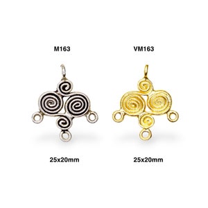 May include: Two silver and gold metal pendant charms with a spiral design. The charms are 25x20mm and have four loops for attaching to jewelry.