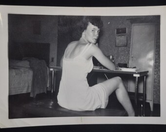Vintage Black And White Photograph Of A Woman In A Slip Eating Fried Chicken