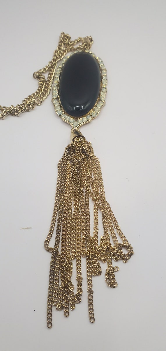 Vintage Necklace With A Large Dark Stone And A Tas