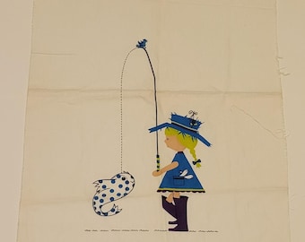 May include: A rectangular off-white fabric panel featuring a screen-printed illustration of a figure with blonde hair wearing a blue hat, blue dress, and dark purple boots. The figure holds a fishing rod with a blue bird on top and a blue-spotted fish.