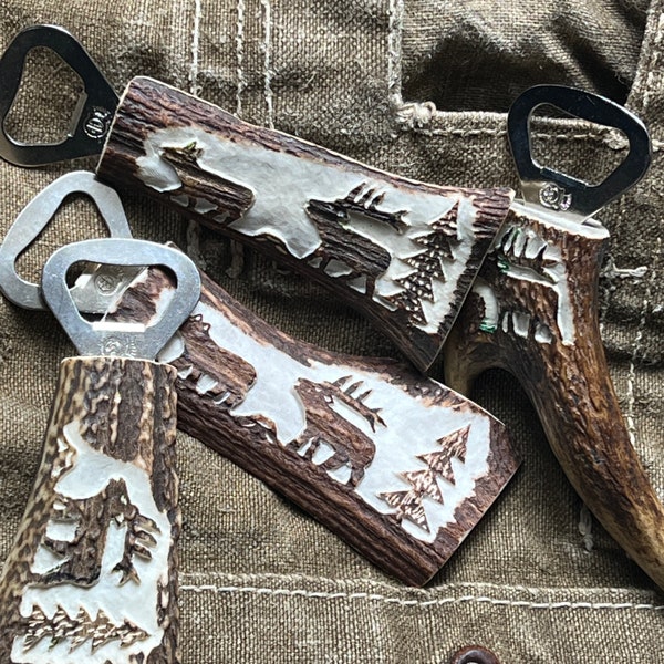 Vintage Nordic wildlife themed bottle opener in genuine carved deer antler.