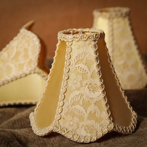Vintage, french boudoir, laced, clip on lampshade. beautifully detailed, with elegant, glossy, beige, edging
